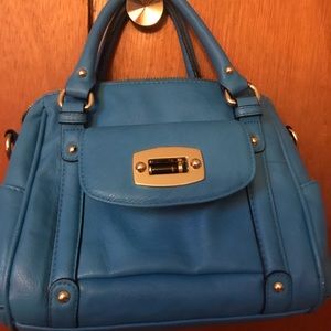 Stylish blue purse.